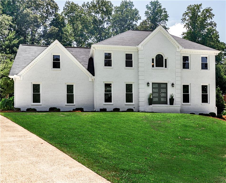 Welcome to this luxuriously elegant five-bedroom home, where timeless design meets modern comforts and every detail has been thoughtfully curated.
Step through the double front doors into a soaring two-story foyer, where rich hardwood floors flow seamlessly across the main level. To your right, a formal den/office offers the perfect quiet workspace; to your left, a sunlit dining room connects effortlessly to the beautifully appointed eat-in kitchen and breakfast nook, all with tranquil views of your private backyard oasis.
The spacious family room invites relaxation and opens to a massive screened porch overlooking the fire pit, ideal for crisp evenings or hosting friends on game day.
Upstairs, you’ll find a convenient laundry room, four generous bedrooms, and two full baths, including a spa-inspired owner’s suite designed for ultimate comfort and retreat.
The finished terrace level is a true standout, featuring its own interior/exterior entrances and separate driveway. Highlights include an oversized bedroom with private en-suite bath, a game/living room, sleek kitchenette with bar seating, additional laundry center, half bath, and a golf cart garage. Golf cart included for quick trips to the community pool, tennis, and pickleball courts!
This versatile space is perfect as a teen/in-law suite, entertainment hub, or even income potential. All of this comes with the added charm of Milton and Alpharetta just minutes away, plus the bonus of lower Cherokee County taxes!