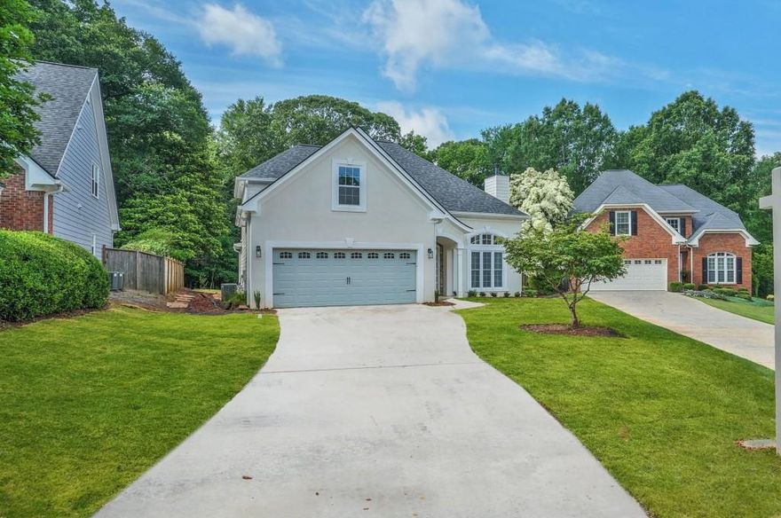 Beautifully renovated three-bedroom, three-and-a-half-bath home nestled along the scenic Chattahoochee River. This 3,266-square+/- foot residence has been meticulously updated, offering modern comfort with timeless elegance. The home features a spacious two-car garage with new flooring, a new roof, updated water heaters, and completely refreshed sod and landscaping with a new irrigation system. A large outdoor patio has been built to enjoy the private backyard. Inside, an additional full bathroom has been added upstairs. Each bedroom includes an en-suite bath, and there is a generous loft area ideal for a playroom, home office, or media space. From the beautiful hardwood floors to the gorgeous granite and marble surfaces, this private oasis is bright, fresh, and move-in ready. From the backyard, you can enjoy the Chattahoochee River, where you'll connect to the community's extensive network of walking trails. Residents also enjoy access to a clubhouse and swimming pool perfect for recreation and relaxation.
