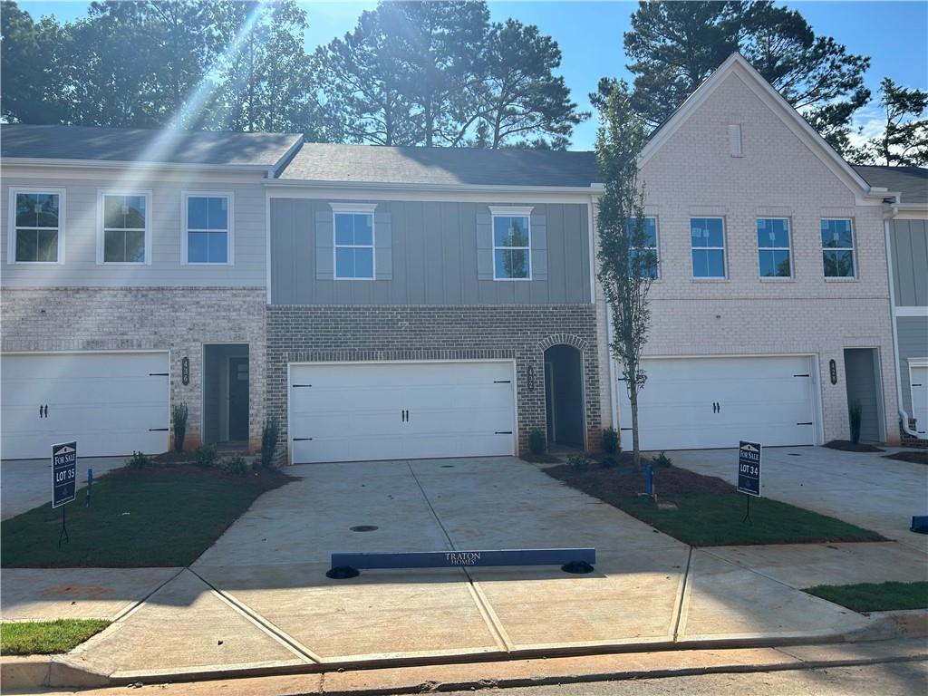 Traton Homes welcomes you to Cherokee Township located in Acworth, Georgia. Building will be ready in September! Our Brooks A floor plan is under construction and ready in September. Come visit our Newest Community - Cherokee Township! Nestled in sought-after Cherokee County. This community offers luxurious 2-story townhomes and is ideally located near major thoroughfares including Hwy 92, I-75 and I-575 with easy access to endless shopping and dining options in Downtown Acworth, Downtown Woodstock and the Outlet Shoppes in Woodstock. The Brooks plan features 3 bedrooms w/ 2.5 baths. Main floor features LVP flooring, 9ft ceilings, open kitchen with oversized island and large walk in pantry. Hardwood stairs lead to spacious Primary suite w/ enormous walk in closet & lovely Primary bath. Two additional generous size bedrooms are set away from primary bedroom for privacy. Versatile loft area, laundry room and full bath complete the upper level. Outdoor living includes a 16x8 patio for entertaining, grilling or hanging out for some sunshine! Decorated model open daily!