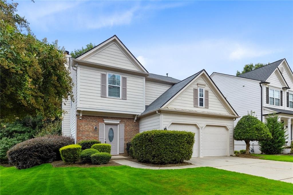 Welcome to this beautifully updated 3-bedroom, 2.5-bath home in one of Milton’s most convenient and family-friendly neighborhoods. The fully renovated kitchen shines with brand-new countertops and luxury vinyl flooring, blending modern style with practical comfort. Enjoy hardwood floors throughout the main level, detailed millwork and trim, and a bright, open layout refreshed with new interior paint throughout. The home offers spacious double vanities in the bathrooms and generous walk-in closets, adding to the livability and appeal. Set on a large lot with ample yard space and nice separation between homes, this property provides privacy and curb appeal. Conveniently located near top-rated schools, shopping, dining, and parks. No rental restrictions make this an excellent investment opportunity as well as a perfect home for owner-occupants.