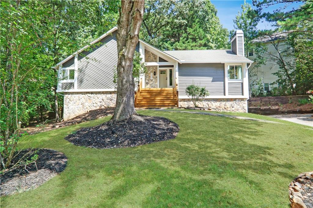 This beautiful fully renovated home in the highly sought after neighborhood, Dover Crossing, is in the heart of East Cobb, offering excellent schools, a convenient location, and modern upgrades throughout. The open-concept 5-bedroom, 3-bath home is filled with exceptional features, natural light and peaceful views, creating a warm and inviting atmosphere. The spacious master suite features a fireplace to wind down, an oversized, spa-inspired shower and a huge walk-in closet. Upstairs there are two additional bedrooms, one with its own en suite bathroom, both flooded with natural light. The versatile lower level can function as an in-law suite, guest retreat, or multi-generational living space. Recent renovations including all new HVAC, new windows, appliances, updated electrical and plumbing, ensures comfort and efficiency for years to come. Also, enjoy the vibrant community with a neighborhood pool, tennis and a welcoming neighborhood atmosphere with year-round organized events. Conveniently located near shopping, dining, and recreational parks, this home perfectly blends modern living with East Cobb charm.