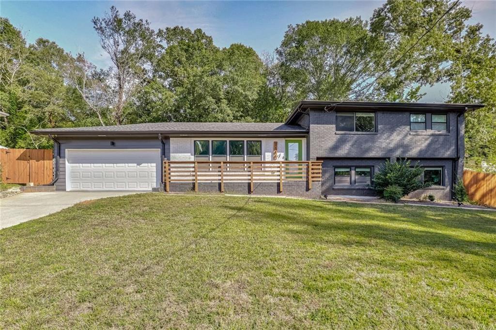 Welcome to your dream home in the heart of East Lake Terrace / Decatur, where modern luxury meets mid-century charm. Fully renovated in 2020, this stunning single-family home offers top-to-bottom updates, exceptional features, and a location that puts you within minutes of Decatur’s best dining, entertainment, and future development.
Tucked away in the tree-lined East Lake Terrace community, this beautifully renovated home invites you to live, work, and play in one of Atlanta’s most exciting neighborhoods. Fully updated in 2020, every detail has been designed with comfort, style, and flexibility in mind.
Step inside and you’ll find a home that’s as versatile as it is inviting. At the heart of the home, an open-concept kitchen with a spacious island and sleek stainless-steel appliances sets the stage for entertaining. Whether you’re cooking weeknight dinners or hosting friends, the kitchen flows seamlessly into the living area so you can gather around the island while keeping an eye on your favorite movie or game.
The two primary suites—one upstairs, one downstairs—make this house perfect for multi-generational living, hosting guests, or even generating short-term rental income. Each suite features a spa-inspired bathroom and a large walk-in closet, but it’s the downstairs retreat that truly steals the show. A hidden closet can easily transform into a cozy “cl-office,” and sliding French doors open directly to the backyard, offering the potential to create your own private courtyard or Airbnb-ready guest suite with its own entrance.
Car enthusiasts and makers will love the two-car garage, thoughtfully outfitted with ample storage and an additional exhaust system—ideal for woodworking, painting, or tinkering on cars. Out back, a second parking pad provides even more space for guests, while a Canadian cedar storage shed stands ready to hold your yard tools—or be reimagined as a backyard mini-bar for weekend get-togethers.
For peace of mind, this home also comes with a state-of-the-art Vivint security system, including mobile-controlled locks, cameras, and thermostat—keeping your home as smart as it is stylish.
The backyard itself is a blank canvas—whether you dream of outdoor dinners under string lights, a lush garden, or a quiet retreat just steps from your bedroom.
And when it’s time to step out, you’ll love how connected you are to all things Decatur. Grab brunch at Poor Hendrix, savor Spanish small plates at The Iberian Pig, or pick up treats from Buena Gente Cuban Bakery. Spend weekends exploring Downtown Decatur’s festivals, playing a round at East Lake Golf Club, or hopping over to East Atlanta Village for live music and nightlife. With major projects like the Bag Factory redevelopment, Vela Park townhomes and retail, and the East Lake MARTA master plan underway, this neighborhood is buzzing with growth and opportunity.
At 2344 Belmont Drive, you’re not just buying a house—you’re investing in a lifestyle. A home with flexibility, character, and future potential in one of Decatur’s hottest zip codes.