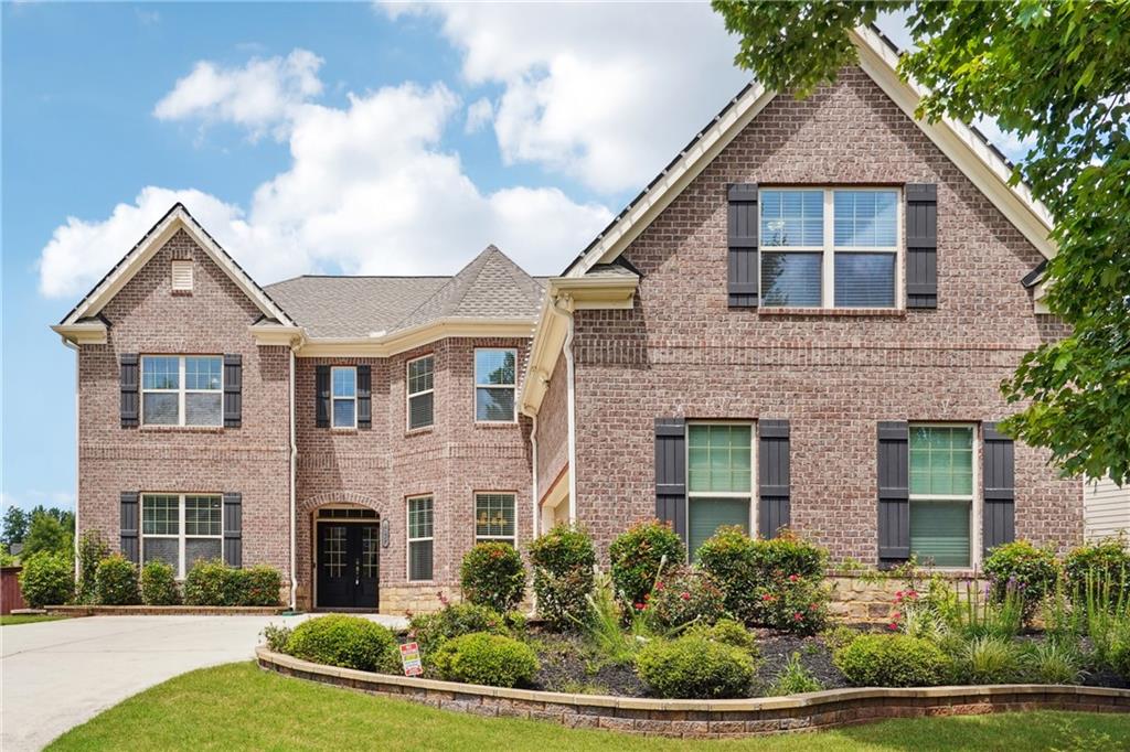 Welcome to the Beautiful Single Family home in the MOST POPULAR and FAMOUS Bridgehampton Community in Alpharetta, Georgia. It’s a 5 Bedroom, 4.5 Bathroom and has 5136 sq ft finished area. Biggest Monroe Floor plan, Elev B with tons of upgrade - Brick front, Finished Bonus room, Upgraded Owner's Retreat, Bookcases in Owner's Retreat, Bookcase in the Family Room, added Retreat room 504 sq ft downstairs in 2023, additionally added 238 sqft hobby room upstairs in 2024, Covered Patio Deck, Huge garden bed, Stone edging around the whole house, Several fruit trees in the Backyard. Beautiful fenced backyard, All rooms are built in Closet by design, Garage has additional storage built, blinds and curtain fixtures installed. Washer, Dryer and Refrigerator included with the house. Exterior of the house has Inspirational holiday lighting design. Huge Family room, Freshly Painted, Sunroom, Private Fenced Backyard, Upgraded hardwood flooring, Upgraded light fixtures, Granite top kitchen, Loft and upgraded bathrooms. Excellent School district and very close to the hwy 400 & Exit 12B and easy access to Midtown or Downtown.