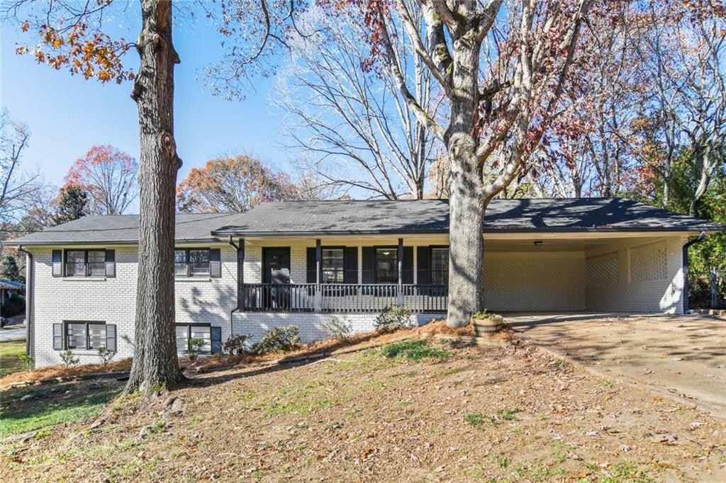 Step into this beautifully renovated 5-bed, 3-bath ranch spanning 2,830 sq ft on a generous corner lot in a quiet, established neighborhood. No HOA means you have ultimate freedom to personalize and manage your property as you wish. The main level welcomes you with a bright, open-concept living area, featuring a brand-new kitchen outfitted with white shaker cabinets, granite countertops, sleek stainless-steel appliances, and a stylish tile backsplash. Plush carpeting and luxury vinyl plank flooring flow seamlessly throughout, while the three upstairs baths gleam with new vanities and granite accents.
Downstairs, an income-generating in-law suite boasts its own private entrance and driveway, full kitchen (stove, sink, cabinetry), washer/dryer units, and a private bath. A long-term tenant currently pays $1,050 /month on a month-to-month lease. New owners may choose to continue or conclude the arrangement.
Enjoy outdoor living on the expansive back deck overlooking your private yard. With easy access to I-20 and minutes from shopping, dining, parks, and top-rated schools, this 2,830 sq ft home truly has it all.