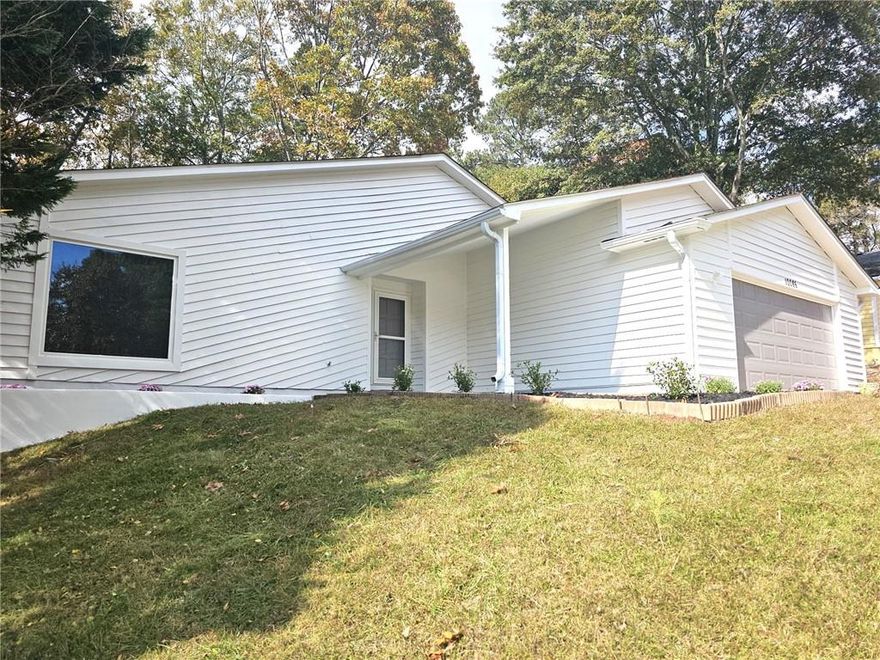 Beautifully renovated 3-bedroom, 2-bath home featuring new windows and flooring throughout. The home offers a completely updated kitchen with white shaker cabinets, white granite countertops, and easy access to the backyard—perfect for everyday living or entertaining. Both bathrooms have been fully renovated with modern finishes. Additional updates include a tankless water heater for energy efficiency. Enjoy a private backyard with a spacious deck, ideal for relaxing or hosting gatherings. The listing agent is a principal of the entity that owns the property and will sign on its behalf. Closing to be handled by Weissman Law Firm.