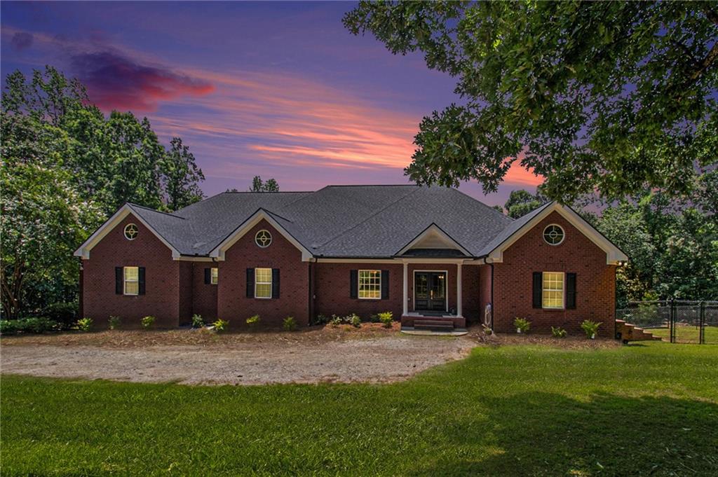 Luxury Brick Estate on 5+ Acres | Mini Farm, Multigenerational Living, Homestead or Homeschool—You Choose
Welcome to a property that redefines possibilities. Nestled on 5+ private, wooded acres with a year-round creek and two fenced areas, this custom brick estate offers space, flexibility, and timeless style for a variety of lifestyles—whether you're seeking a mini farm, multigenerational retreat, homeschool sanctuary, or luxury homestead.
Boasting over 5,600 square feet on the main level and an additional 3,900+ sq ft of walkout basement space ready for your vision, this home was built to grow, adapt, and elevate how you live.
Step inside through grand double doors and you’re immediately welcomed by light-filled, open-concept spaces, rich hardwood floors, custom trim, and a thoughtful split-bedroom layout that balances privacy and connection. The formal dining room is built to impress, with a dramatic tray ceiling and chandelier ready for hosting family events or everyday celebrations.
The chef’s kitchen is a dream for those who cook, can, prep, or entertain—featuring multiple prep areas, granite countertops, stainless appliances, a walk-in pantry, and a butler’s pantry perfect for extra storage or food preservation.
Need space for homeschooling, crafting, working from home, or running a business? The dedicated flex room off the foyer is ready for it all. Upstairs, a spacious bonus room makes the perfect game room, media room, or learning lounge.
The primary suite is a serene escape with a sitting area, soaking tub, separate shower, dual vanities, and an oversized walk-in closet. On the opposite side of the home, two bedrooms share a Jack-and-Jill bath, while a second master suite offers a private en suite and walk-in closet—ideal for teens, guests, or in-laws.
But the real game changer? The walkout basement: tall ceilings, wide-open layout, rough-in plumbing, and a state-of-the-art water filtration system already in place. Whether you envision apartments, workshops, a home gym, school pods, or extra storage—there’s room to make it happen.
Outside, this property is equally impressive:
Two fenced areas—ready for gardening, chickens, goats, or pets
A spacious deck overlooking mature hardwoods and your own private green space
Four-car garage
ADA-compliant doorways for accessibility
Long driveway and wooded frontage ensure true seclusion
Whether you’re dreaming of a quiet homestead, starting a family farm, teaching from home, or housing generations under one roof—this estate has the room, the style, and the systems to support it all.
Luxury, land, and lifestyle come together here. Schedule your private showing today and see how this rare property can work for you.