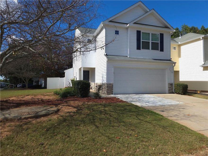 Welcome home to this beautifully maintained and thoughtfully designed 3-bedroom, 2.5-bathroom home. This 2003-built gem offers the perfect blend of suburban serenity and urban-inspired convenience – all within Forsyth County's top-rated school district. Step inside to an inviting open-concept main level space, where a sunlit living area flows seamlessly into a sleek kitchen and adjacent dining space that opens to a private rear patio, perfect for al fresco dining in a private backyard. Upstairs, the primary suite serves as a tranquil haven with a walk-in closet and en-suite bath. Two additional generously sized bedrooms share a full bath, providing ample space for family or guests. There is a lofted space that can be used as an excellent office space or can be converted into a fourth bedroom.
Outside, enjoy low-maintenance living with the HOA's lawn care, allowing more time to explore the vibrant shopping just moments away. So close to award-winning restaurants, boutique shops, an artisan craft brewery, and the expansive Forsyth County Family YMCA – complete with fitness centers, pools, and community programs. Stroll to weekly farmers' markets, live music on the Village Green, or outdoor concerts in this charming, new-urbanism haven.
Conveniently located minutes from the sparkling shores of Lake Lanier for boating and hiking adventures, the bustling North Georgia Premium Outlets, Dawsonville's mountain trails, and Northside Forsyth Hospital, this address delivers the best of North Georgia living. Whether you're seeking a peaceful primary residence or a savvy investment in a renter-friendly neighborhood, 5305 Mountain Top Place invites you to embrace a lifestyle where community, convenience, and charm converge.
Don't miss this rare opportunity – schedule your private tour today and make this your forever home!