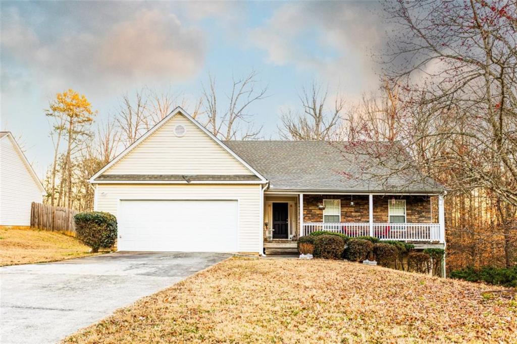 Awesome ranch 3br/2bath home on a full unfinished basement in The Woods of Dearing. Walk into the large open living room with stone wood burning fireplace. Thought the separate dining room you will find the kitchen with new white cabinetry, granite counters and Stainless appliances. This home has new bamboo floors throughout the main area. Down the hall there are two secondary bedrooms, and a full bath. The master suite offers treyed ceilings, walk in closet, double vanity, and separate garden tub and shower. The basement is ready to be finished out for more bedrooms or storage. Come see this great home today!