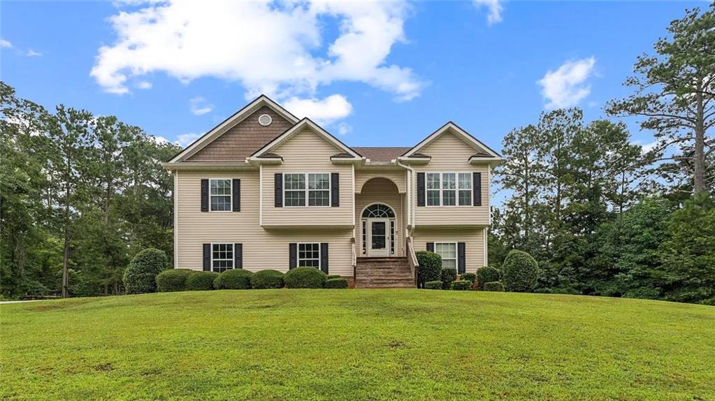 JOIN US FOR AN EXCLUSIVE FIRST SHOWING OPPORTUNITY AT OUR SUNDAY TOUR OF HOMES OPEN HOUSE EVENT- THIS SUNDAY JULY 26TH 2-3PM! Awesome Covington Home For Sale Under 350k! * Home buyers! This is a CERTIFIED PRE OWNED HOME with satisfactory home inspection, free 2 year home warranty covering up to 25k in repairs/ replacements, buyer satisfaction guarantee- LOVE THIS HOME, OR WE'LL BUY IT BACK! PLUS take 1% off your interest rate and $5,000 CASH towards financing when financing with our team at Nexa Mortgage- for more info, ask directly. Move in- ready, stunning home with 4 spacious bedrooms and 3 full baths. Vaulted ceilings in the living room, with stone fireplace. Stainless steel appliances in the chef's kitchen with extra counter top space/ storage. Huge master suite with 2 walk in closets, separate tub shower, and double vanity. Finished walk out basement with bedroom and full bathroom, plus bonus living area, great for entertaining guests. Private, level lot just under 1 acre in a NO HOA neighborhood! For more information on this exclusive property or to schedule a private tour, ask our team directly and start packing!