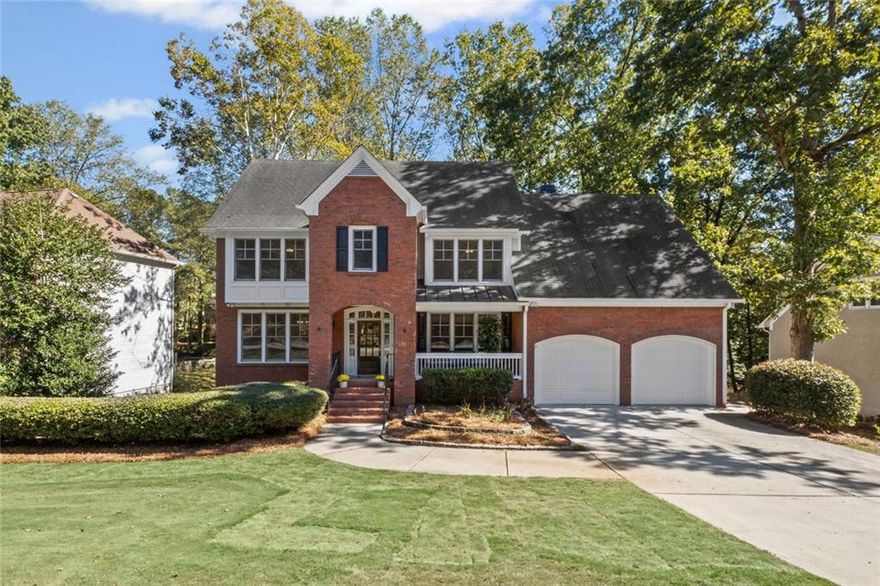 Welcome home to this spacious residence in the highly sought-after Loring Square swim and tennis community!

You’ll be impressed the moment you step into the grand two-story foyer, flanked by a custom-built library on one side and a formal living room on the other. The main level boasts a large formal dining room that easily seats twelve, and a beautifully appointed kitchen featuring solid-surface countertops, stainless steel appliances, and a cozy breakfast nook with expansive windows overlooking a tranquil wooded lake view.

Just off the kitchen is a sunken family room with a fireplace and custom built-ins, opening directly onto the deck—perfect for year-round entertaining. A convenient half bath, coat closet, and access to a spacious two-car garage with additional storage complete the main level.

Upstairs, the generous owner’s suite includes a luxurious en suite bath with a jacuzzi soaking tub, walk-in shower, dual vanities, water closet, linen closet, and a walk-in closet. Three additional bedrooms with ample closet space, two full baths, a laundry room with utility sink, and a unique loft area with custom desks connecting two of the bedrooms offer plenty of functionality and charm.

The fully finished lower level includes four versatile rooms all with custom wood shelving and bookcases. You will find a wet bar, full bathroom with walk-in shower, two utility rooms, and two decks—ideal for guests, a home office, or multi-generational living.  Freshly painted throughout, this home is in move-in condition.

All of this is just minutes from historic Kennesaw Mountain National Battlefield Park, schools, shopping, dining, and more.