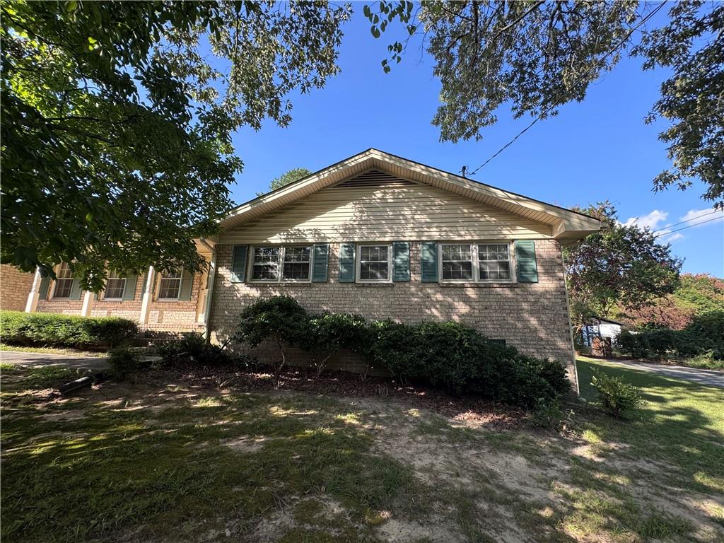 Charming 3-Bedroom Ranch in Snellville – Spacious Lot, New HVAC, and Endless Potential!
Welcome to this well-maintained 1973 ranch offering 1,558 square feet of living space, situated on a generous lot with a large front and fenced-in backyard—ideal for outdoor gatherings, kids, pets, or gardening.
This 3-bedroom, 2-bath home features a formal living room and a separate family den with a cozy gas fireplace, providing plenty of space to relax and entertain. The detached garage is a huge bonus, complete with electrical and gas connections—perfect for a workshop, hobby space, or additional storage.
With a new HVAC system, and a 12 yr roof & 11 yr water heater, this home is already on its way to being transformed. A true clean slate, it’s ready for first-time homebuyers or investors looking for a rewarding fixer-upper opportunity.
Located just minutes from great restaurants, shopping, and highly rated Gwinnett County schools, this home combines convenience with potential. Bring your vision and make this classic ranch your own!