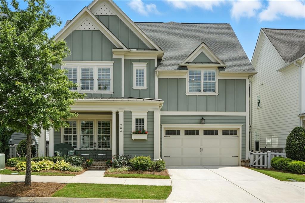 Stunning Townhome in the Heart of Downtown Woodstock | Exclusive John Wieland Collection | 1 Owner | Upgrades Throughout
Welcome to this beautiful, one-owner townhome located in the highly sought after South on Main community, just steps from downtown Woodstock, offering easy access to Highway 92 and I-575. This immaculate home, exclusive to the John Wieland collection, combines the charm of a single-family home with the convenience of townhome HOA privileges.
As you pull into the garage, you’ll be greeted by a pristine, epoxy-finished floor—just one of the many upgrades that make this home feel like new. Inside, enjoy the elegance of plantation shutters throughout, adding a touch of sophistication to every room.
The gourmet kitchen is a chef's dream, featuring sleek stainless steel appliances, abundant cabinetry, and ample counter space—ideal for both everyday meals and entertaining. Step outside to your private back patio and meticulously maintained yard, complete with low-maintenance, professionally installed artificial grass that stays lush year-round.
Upon entering, you’ll be welcomed by a charming foyer with beautiful shiplap detailing. The spacious living room offers a cozy ambiance, highlighted by built-in bookshelves, perfect for hosting guests or unwinding after a long day.
Upstairs, you'll find the luxurious primary bedroom retreat, complete with two walk-in closets and a spa-like en suite bath. A stylish barn door opens to an additional flexible space, ideal for an office, nursery, or extra bedroom. A second spacious bedroom also features its own full bath with double vanities. The convenient second-floor laundry room includes built-in cabinets and a sink.
The third level is dedicated to entertainment and relaxation, featuring a massive bonus room—perfect for a home theater or game room. A private guest bedroom and full bath provide ultimate comfort and privacy for your visitors.
Your new community offers a range of amenities for an active and social lifestyle. Enjoy the Olympic-sized pool, dedicated children’s pool, community garden, community amphitheater, and outdoor fire pit. Host events at the clubhouse or relax in the scenic, professionally landscaped areas. For nature enthusiasts, serene walking trails are located right behind the neighborhood, offering a peaceful retreat into nature.
Located just minutes from downtown Woodstock, you’ll have quick access to shopping, dining, and entertainment. Take a leisurely stroll or hop on your golf cart for a quick trip to all the vibrant downtown activities.
Don’t miss out on the opportunity to call this stunning home yours—schedule a showing today!