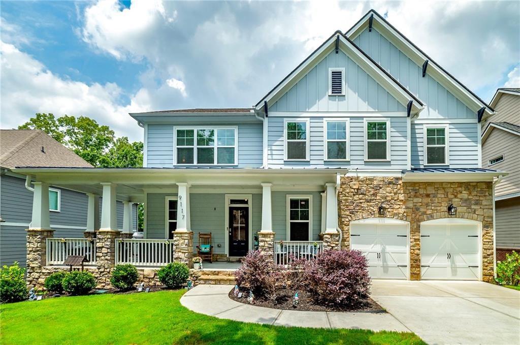 SELLER IS MOTIVATED and OPEN TO ALL OFFERS! This stunning 5 bed, 4.5 bath, 3-level home offers upgraded features throughout, including a charming wrap-around porch, coffered ceilings, executive trim, and no carpet on the main level. The gourmet kitchen boasts granite countertops, double ovens, white cabinetry, a built-in desk, and an upgraded LG refrigerator with craft ice. Enjoy a spacious layout with formal dining, a private office with French doors, stone electric fireplace, and guest suite with private bath on the main. Upstairs you'll find oversized bedrooms with large closets and updated carpet. The owner's suite features a spa-like bath with tiled walk-in shower, soaking tub, and double vanities. A full unfinished basement is stubbed for a bath and ready to become a gym, theater, or even two more bedrooms, potential for a 7-bedroom home. Outside, enjoy a private backyard with an extended patio a rare for the neighborhood. Includes a transferable 2-10 home warranty. Community perks include a pool, clubhouse, playground, dog park, and more! Schedule your tour today! The BEST part is 100% financing is available for this home!