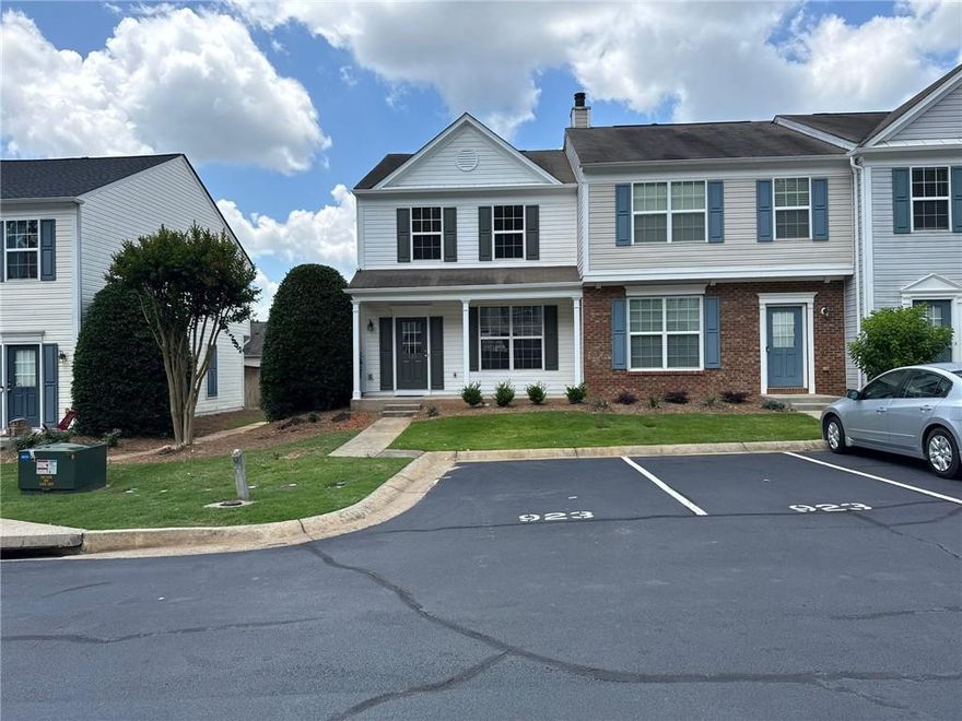 This spacious 2 story corner-unit townhouse features two large bedrooms, each with its own attached full bathroom. The home is well-maintained and completely renovated with a new granite countertop kitchen, all new bathrooms, new carpet/flooring, fireplace and new paint. It also includes stainless steel appliances throughout. Inside, the home is fully carpeted, except for the walk-in areas, kitchen, and dining space. A washer and dryer are conveniently located in the unit for your use. Enjoy outdoor relaxation on the beautiful patio in the back.  It is equipped with central air conditioning and forced air heating. Being a corner unit, the living room consists of four French glass sliding doors leading to the patio-double the amount found in other townhomes. As a corner unit, trash disposal is more convenient, eliminating the need to drag garbage cans from the middle of the block. As part of the Whittington community, the townhome is located in the highly regarded Forsyth County School District, the community offers great amenities, including a swimming pool, pet park, kids playground and tennis courts. The townhouse comes with two assigned parking spaces right in front, with additional visitor parking available just around the corner. The property offers excellent accessibility, with easy access to major highways, including GA 400 and the new McGinnis Ferry exit currently near opening. Shopping centers and restaurants like Halcyon, Avalon and downtown Alpharetta are all nearby