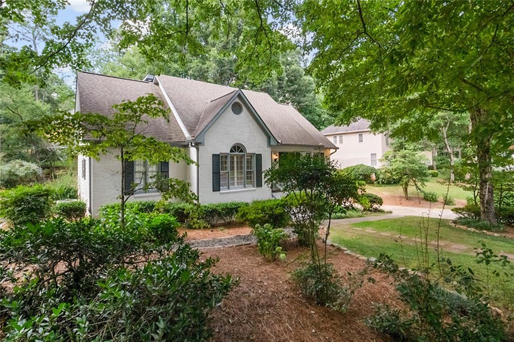 Welcome to 2838 Saddlebrook – where timeless charm meets modern convenience in one of East Cobb’s most desirable swim/tennis communities. This beautifully updated limestone-wash home sits on a tree-lined street in the active Saddlebrook neighborhood, known for its clubhouse, pool, tennis courts, sidewalks, and top-rated schools.
Enjoy a sun-filled interior featuring a spacious sunroom with walls of windows overlooking a professionally landscaped backyard. The kitchen is a dream—granite island, gas cooktop, LG refrigerator with dual icemakers, high-end faucet, new dishwasher and disposal, and a custom-built, floor-to-ceiling pantry for abundant storage. The main level also boasts a walk-in laundry room and a serene primary suite with upgraded sinks and finishes.
Recent improvements include:
New Hardie plank siding and trim
New 10x10 back deck and 4’ privacy fence
Cedar bridge over stormwater drain
New exterior insulated doors, flood lights, and lighting fixtures
All new toilets, upgraded plumbing (PVC to CPVC)
New water heater (2024)
Electrical upgrades with GFCIs and added outlets
Chimney cap, attic insulation replacement, and alarm system
HVAC under service contract, termite, pest, and critter plans in place and transferrable
The backyard has been extensively graded, several hazard trees removed, and lush landscaping added for beauty and function. With exceptional curb appeal, thoughtful interior upgrades, and a vibrant community setting, this home is truly move-in ready and waiting to welcome you home.