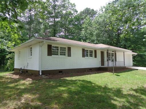 Recently remodeled inside and out! This 3BR/1.5BA Brick Ranch style home has a contemporary kitchen, appliances, granite countertops, hardwood/laminate floors, carpet, custom lighting fixtures, 2 yr old HVAC system, 2 yr old roof, 2-car garage, open/spacious backyard and much more. Located in established Austell neighborhood, very convenient to shopping, restaurants and the East West Connector. Fantastic home at this price. Hurry, this one won't last!