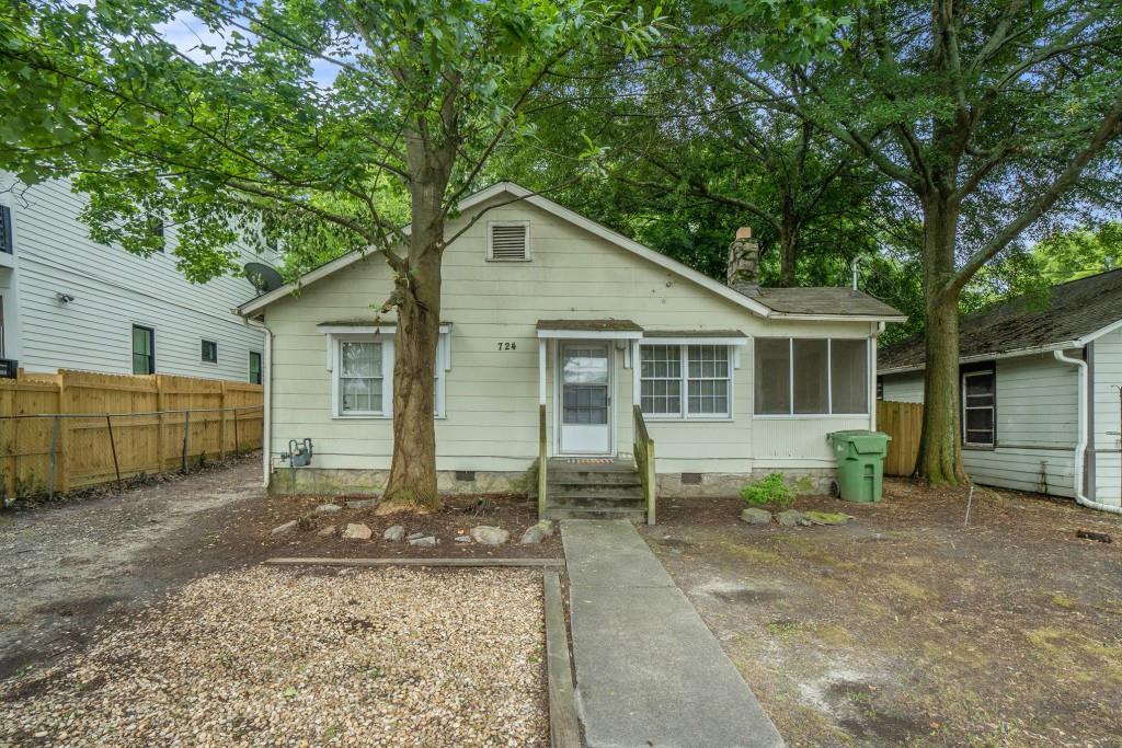 Investor Opportunity in Atlanta's Hot Westside! Located in the Sought-After Berkeley Park community, this classic bungalow is just Steps to Shopping, Dining, Entertainment, and everything the vibrant Westside has to offer. With Hardwood Floors Throughout, the home features a cozy Family Room with a Stone Fireplace, an Eat-In Kitchen, Two Bedrooms, and One Full Bathroom a solid foundation for a rental, renovation, or redevelopment. Outside, enjoy a Screened Porch, a Rear Deck, and a Flat Backyard with a Large Storage Shed perfect for future upgrades or added value. Zoned for intown convenience with easy access to Midtown, Downtown, GA Tech, and I-75, this is a prime investment in one of Atlanta's fastest-growing neighborhoods. Don't miss this chance to add to your portfolio!