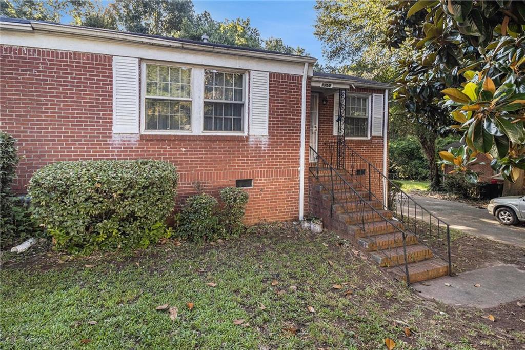 This charming 3-bedroom, 2-bathroom home in South Atlanta is a fantastic renovation opportunity. It features a spacious living room, ample closet space, and a nice size dining area. Step out to a shaded backyard, perfect for relaxation. With plenty of parking and easy access to I-85, I-285, and the Atlanta Airport, this home is convenient to downtown Atlanta as well. Don't miss out!