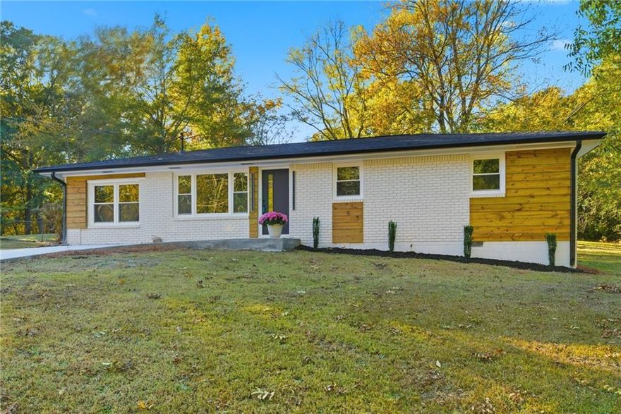 Welcome to this beautifully renovated 4-bedroom, 2-bath ranch in desirable Lithia Springs! This single-level home blends timeless comfort with modern upgrades throughout. Step inside to discover new hardwood floors, designer lighting, and an open layout ideal for everyday living and entertaining.
The kitchen features quartz countertops, a brand-new gas stove, sleek cabinetry, and modern fixtures, ideal for cooking and entertaining. Both bathrooms feature stylish tile, updated vanities, and spa-inspired finishes.
Enjoy peace of mind with thoughtful updates inside and out, including a new driveway and a spacious back patio with ambient lighting, perfect for relaxing or entertaining outdoors.
Tucked on a quiet street yet close to shopping, dining, and major routes, this home offers the perfect balance of convenience and tranquility. Designed for anyone seeking comfortable single-level living, this turnkey property provides a flexible home office, easy-care layout, and room to grow, making it move-in ready and waiting for you.
Don’t miss your chance, schedule a private showing today!