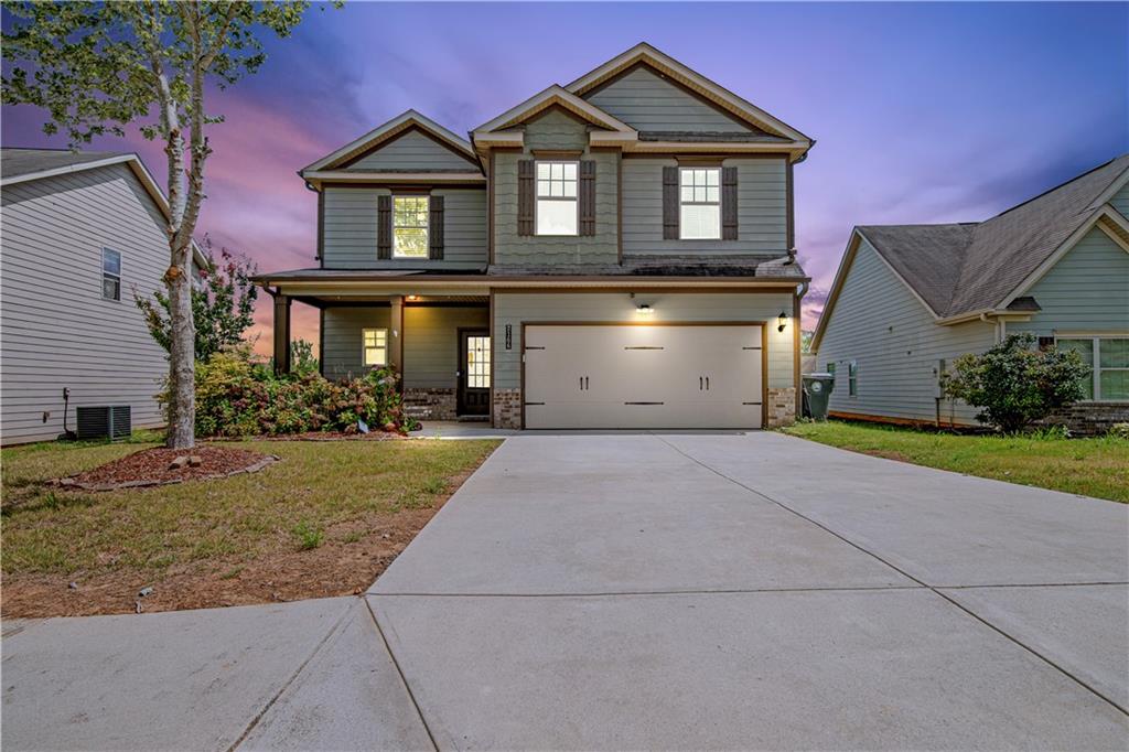 Move-in ready 2016 home with no carpet and a freshly painted interior! Enjoy a spacious open-concept layout, updated lighting throughout, and a large, fenced backyard perfect for entertaining. Conveniently located just minutes from Highway 316. This home offers comfort, style, and easy access to everything you need!