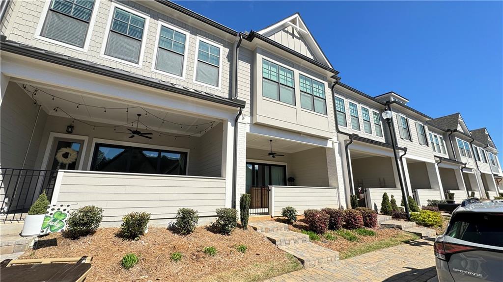 Amazing price of $2800 in the Gated Community The Village at Towne Lake ~ Open Concept, 3 Bed/2.5 Bath ~ With 11 ft ceilings on the main floor, 10 ft 2nd floor, and 8 Ft interior doors throughout, you will feel like you are in a loft-style home with plenty of light. The Family Room has a Wall of Sliding Glass Doors that open up to the HUGE, covered front porch, bringing the outside into the inside and vice versa. The Kitchen Features Quartz kitchen countertops w/ 42" Gray Cabinets, Stainless Steel Chimney Vent ~ Island with barstool seating, SS appliances & a wonderful Skylight above the sink! EVP Flooring is throughout the main level, the upstairs hallway, and the loft. Upstairs, you will find an oversized Master Bedroom with custom closets off the gorgeous owner's en-suite. Down the hall is the laundry room with a washer and dryer, 2 additional bedrooms, and a small loft area, perfect for an office nook. Explore this amazing community featuring a Luxurious Clubhouse with amenities including a poker table, pool table, catering kitchen, Fitness center, Swimming pool w/cabana, Pickleball, Bocce ball, Fire pit, and Dog park, all within this gated community. You are just one short mile from Historic, Downtown Woodstock, which has been rated as one of the top entertainment districts in suburban Atlanta. Walk to lively downtown Woodstock, with restaurants, shops, nature trails, parks, art, and music venues with planned events for the entire family. To top off this fantastic home, for the outdoor enthusiast, you are only 1 mile away from Rope Mill Park with miles of hiking and biking trails and a river for kayaking and fishing. The home is currently tenant occupied and will be available June 1st.