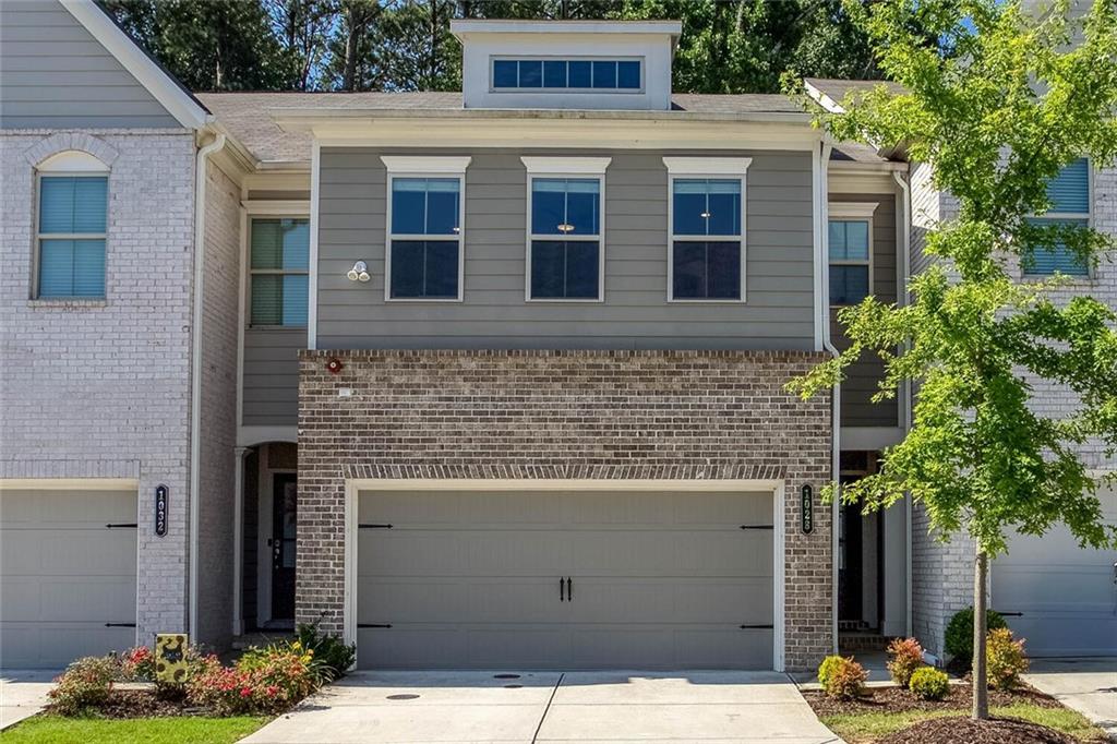 Stylish Living Meets Tranquil Comfort in This One-of-a-Kind 3-Bedroom Townhome with LOFT SPACE in one of Metro Atlanta's most sought-after communities, Cobb County! Tucked quietly in the back of the beautifully maintained Parkside East community, this 3-bedroom, 2.5-bath townhome offers the perfect blend of luxury, comfort, and location. With no neighbors behind you and a peaceful backyard backing up to mature trees, serenity is just outside your door. Step inside and fall in love with the unique, open floor plan designed for modern living.
The gourmet kitchen features top-of-the-line stainless steel appliances, a double oven with convection options, quartz countertops, under-cabinet lighting, and extra custom cabinetry for a high-end finish. Upstairs, a spacious loft is perfect for a home office, playroom, or movie den. The primary suite easily fits a king bed with a sitting area, and the custom California Closet adds boutique-level organization. Two additional bedrooms offer plenty of space for family or guests.
Smart home features include Nest thermostats, in-ceiling speakers, additional LED lighting with dimmers, pre-wired security system with PoE, and an app-enabled garage door opener. Enjoy the private backyard and community amenities including a dog park, fire pit, and natural reserve.
The Parkside East community itself offers a dog park, cozy fire pit, and a beautiful natural reserve, creating an active yet serene lifestyle surrounded by neighbors who care. You'll be just 5-10 minutes from shopping, dining, and everyday conveniences, and a short drive from vibrant and historic Marietta Square and the infamous Battery Atlanta, home of the Atlanta Braves! This townhome is a rare gem. Come experience what it's like to live in a place that truly feels like home. Don't miss out-schedule your showing today.