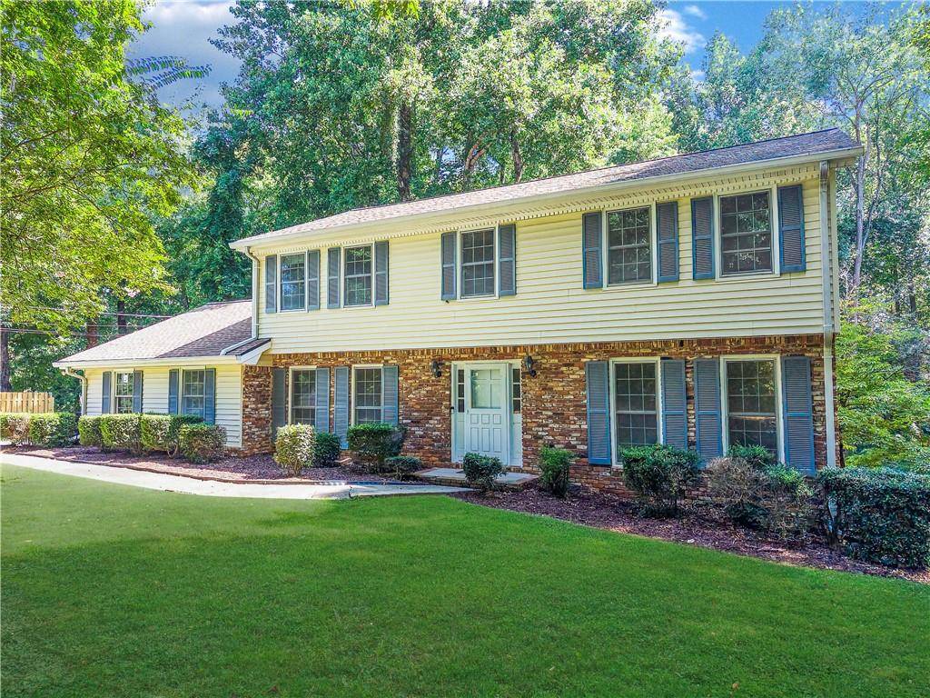 Welcome to this solid estate owned home nestled in Roswell’s desirable North Point neighborhood—just minutes from the Chattahoochee River trails, multiple parks, and the shops and restaurants of historic Canton Street. Brimming with potential and original charm, this two-story traditional offers great bones and timeless features, ready for your personal touch. Step inside to find original hardwood flooring throughout, large windows that fill the home with natural light, and a classic layout that includes a fireside family room, formal living and dining rooms, and a spacious eat-in kitchen overlooking the private backyard. Upstairs features four generously sized bedrooms and two full bathrooms, including a primary suite with ensuite bath. The walkout basement is partially finished and offers endless possibilities—create a rec room, home office, workshop, or guest suite. The outdoor space is perfect for nature lovers and weekend adventurers, with easy access to the Chattahoochee River, hiking trails, and vibrant community events. As a bonus, the neighborhood offers an optional swim and tennis membership—ideal for those seeking an active lifestyle and a strong sense of community. This is a rare opportunity to own a well-maintained home in an unbeatable location—don’t miss your chance to restore, renovate, and make it your own.