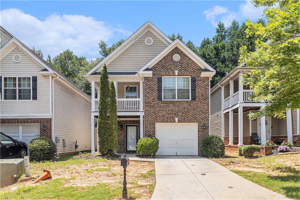 Welcome home! Investors & Savvy homebuyers alike. Beautiful 3 bed/2.5 bath in Park View at Shadowrock Lakes! Spacious family home featuring an inviting living room with a cozy fireplace and an open dining space. The kitchen offers dark-stained cabinetry and black appliances. The upper level showcases a desirable split-bedroom layout, with a primary suite that includes a generous walk-in closet and an ensuite bathroom complete with a relaxing soaking tub and a separate shower. Step outside onto the rear porch, perfect for outdoor gatherings or gardening. Conveniently located near Hwy 78, The Southland and Mystery Valley Golf Courses, and just moments away from downtown Stone Mountain and Stone Mountain Park. Happy Showing!