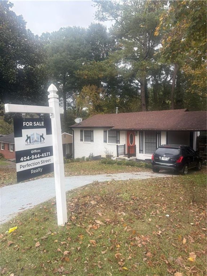 Home Sweet Home!  Renovated Atlanta Bungalow on quiet street.  Home features hardwood floors and an open floor plan.  Modern and up to date eat in kitchen with bar.   Bathroom bright and up to date with white title and vessel sink.    Carport attached and basement for extra storage.   Back yard has modern fence and private backyard.   Near public transportation.   Atlanta airport, restaurant, schools, nearby.