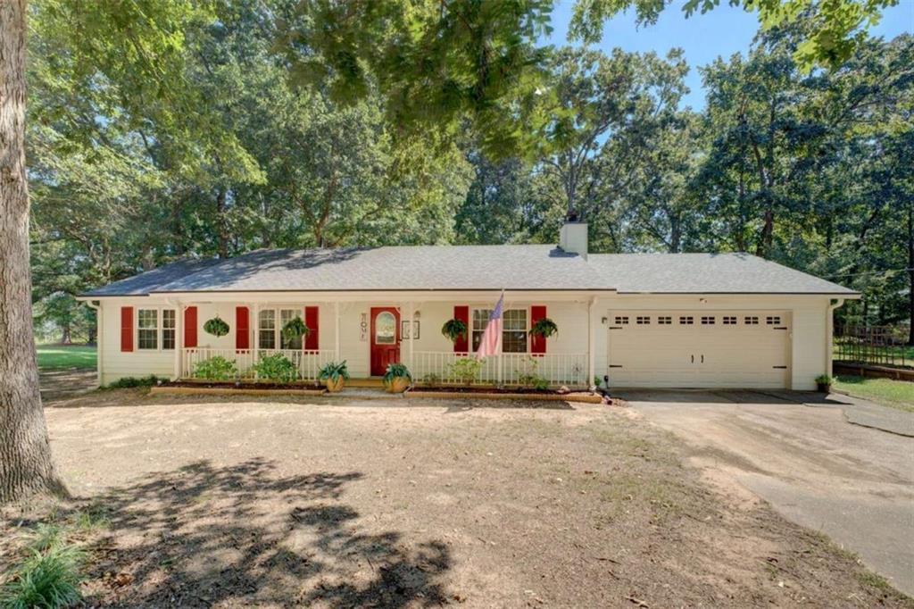 This adorable, well-cared for jewel a spacious ranch floorplan, wooded lot and cozy, screened porch oasis that overlooks the serene backyard ideal for outdoor activities and relaxation. The DETACHED SHOP features a lean-to and power. Master features walk-in closet, bathroom ceiling skylight and oversized soaking tub. Home upgrades include new interior paint, luxury vinyl plank flooring throughout, new kitchen countertops and lower cabinets, new hot water heater replaced 2024; HVAC & windows (low e insulated) replaced 2020; roof replaced 2019. Exterior siding is Hardie Plank fiber cement. Gutters also have leaf guards. This established neighborhood is minutes to I-75 access and very convenient to schools, parks, shopping, dining and entertainment! No HOA!