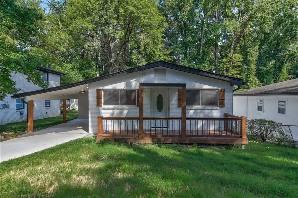 Located in the sought-after Central Hill neighborhood of Atlanta, this brick-front ranch offers a complete transformation that balances modern style with everyday comfort. Thoughtful updates and refined finishes flow throughout the home, creating a space that feels both functional and inviting.
The open design is filled with natural light, seamlessly connecting the living and dining areas. At the heart of the home, the kitchen is designed for both ease and elegance—featuring quartz counters, abundant cabinetry, a breakfast bar, and all-new stainless steel appliances. Durable luxury vinyl flooring runs throughout, giving every room a polished look without compromising practicality.
The private owner’s suite provides a true retreat with a spacious walk-in closet and spa-inspired bath, complete with a double vanity and sleek, oversized shower. An expansive bonus room adds even more versatility, opening directly to a generous deck—perfect for gatherings, a home office, or a quiet reading space.
Outdoors, you’ll find a covered carport, attached storage shed, and plenty of room to unwind. Conveniently positioned near shopping, dining, public transit, and major thoroughfares, this home offers easy access to all that Atlanta has to offer.