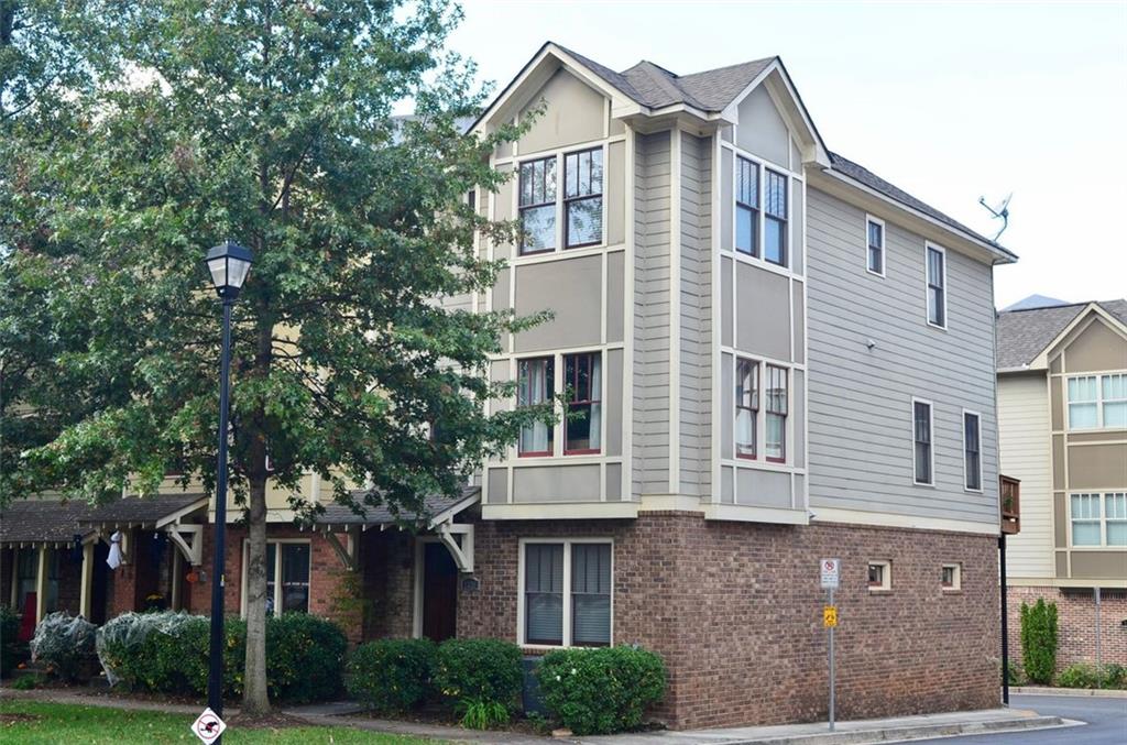 Location, location, location! Exceptional townhome in the heart of Oakhurst - across the street from FAVE upper elementary and an easy stroll to Oakhurst Village as well as 2nd + Hosea, with multiple restaurants, coffee shops and other amenities. This spacious end-unit home has a 2 car garage, windows on 3 sides, and hardwood flooring throughout the common areas and the lower bedroom. Wall to wall carpet in the remaining bedrooms. Enjoy quality stainless appliances, gas range, washer and dryer included, 9 foot ceilings, and transitional finishes/fixtures and a great open concept floorplan. There is also a sizable walk in pantry. This 4 bedroom, 3.5 bathroom home checks so many boxes!