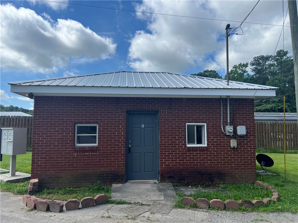 New Paint, New Vinyl Flooring. Studio unit with small kitchenette with oven/range and refrigerator. $600 Deposit. Tenant is responsible for all utilities. 4 sided brick exterior.
