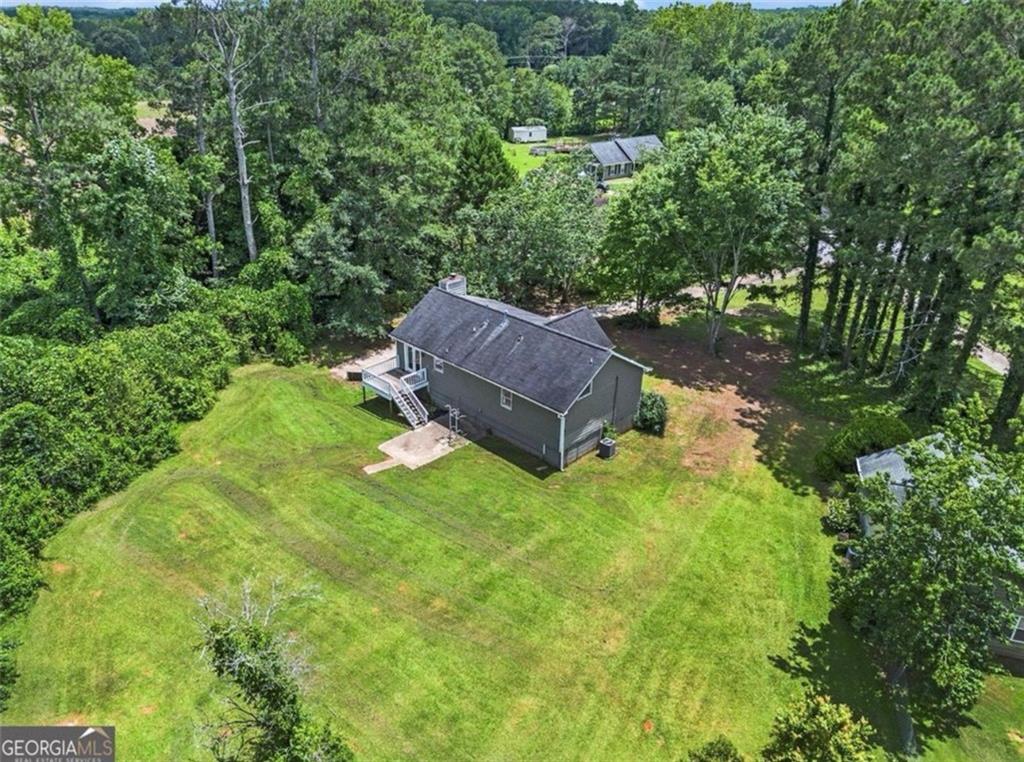 Enjoy over an acre of private land in sought-out Sharpsburg - perfect for entertaining, gardening or relaxing. This move in ready ranch (on a finished basement) offers spacious one level living, an updated kitchen, and a cozy family room with vaulted ceilings. No HOA and plenty of parking for RVs or boats.