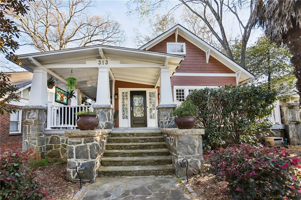Charming Intown Bungalow with Guest Cottage – Classic Comfort Meets Modern Convenience! Welcome to this beautifully renovated Midtown bungalow, where timeless character blends effortlessly with thoughtful updates and versatile living spaces. This inviting home offers a rare chance to enjoy city living at its best—with the added bonus of a fully equipped guest cottage perfect for extended family, visitors, or a private home office. Step onto the gracious covered front porch and into a light-filled main home featuring high ceilings, gleaming hardwood floors on both levels, and spacious rooms throughout. The warm and welcoming living room is centered around a cozy fireplace and framed by elegant coffered ceilings and six oversized windows, bathing the space in natural light. A formal dining room, also with coffered ceilings, offers the perfect setting for dinners with friends or holiday gatherings. The kitchen is a true highlight—designed with the home chef in mind, featuring ample counter space, a walk-in pantry, and a bright breakfast nook for everyday dining. Every bathroom has been tastefully updated, offering modern comfort with timeless appeal. Upstairs, the large primary suite is a true retreat, with a sitting area, oversized closet, and a spa-like bath with a skylight. A flexible den/media room could easily serve as a fourth bedroom, nursery, or home gym. The separate guest cottage offers a full kitchen, bedroom, and bathroom—ideal as a private space for visitors, a long-term in-law suite, or even a creative studio. The private backyard feels like an oasis in the heart of the city, complete with a deck, patio, and hot tub—perfect for relaxing or entertaining. Additional features include a basement for storage, and off-street parking for 2–3 cars. All this just blocks from Piedmont Park, the BeltLine, and the vibrant shops, dining, and entertainment of Midtown. Whether you're putting down roots or looking for a flexible living arrangement, this rare gem combines classic charm, modern updates, and unbeatable location in one perfect package. Come see it today and fall in love! The property is currently used as a short-term rental, with revenue spreadsheets available upon request for those interested in exploring its full potential.