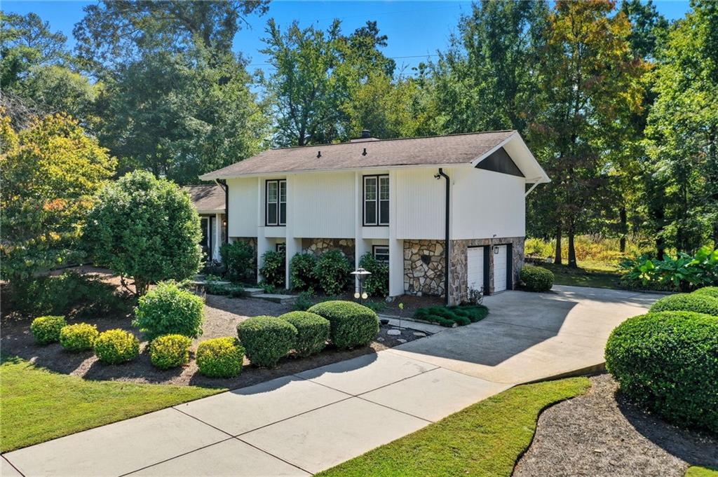 Spectacular Opportunity in Indian Hills Country Club! Welcome Home to a rare find nestled inside the prestigious Indian Hills Country Club community. Behind its unassuming exterior lies a home with serious upside, waiting for a buyer who sees both character and potential.
Set on a generous ¼-acre flat lot, this property balances privacy and convenience in one of Marietta’s most sought-after enclaves.
Inside, you’ll find a layout ready for immediate enjoyment and future enhancement. The main level boasts marble floors that bring elegant durability, while hardwoods and tile throughout reinforce a premium feel. Recent upgrades remove any new homeowner worries: a brand new HVAC system throughout, a new water heater, crawl space is waterproofed and has a lifetime warranty through Aquaguard, California Closets in all bedrooms, and fully remodeled bathrooms ensure you’re not chasing mechanicals out of the gate.
Rooms are bright and anchored by neutral finishes. The bones are solid, and this home invites personalization - whether you want to modernize further, expand, or simply live comfortably as is.
Rare chance to secure a prime lot in the coveted Indian Hills Country Club community, perfectly positioned in the Walton High School district (one of Cobb County’s top-rated high schools).
From the moment you pull up, you sense possibilities. This isn’t just about what’s here now - it’s about what this aggressively priced gem in Indian Hills could become. If you’re browsing Zillow listings, let this one surprise you. Investors, move-in buyers, or value seekers - all have something to love here. Welcome Home!