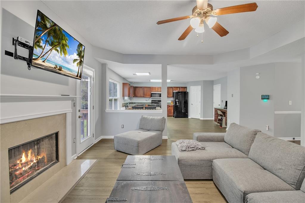 This stunning 6-bedroom, 4-bathroom home is nestled in a quiet cul-de-sac, offering exceptional space and versatility. With up to four family seating rooms and a bonus bedroom in the basement (bringing the total to 7) this residence provides the perfect blend of comfort and style. Natural light floods the bright and open living spaces, creating a warm and inviting atmosphere. The bedrooms are generously sized, while the beautifully maintained bathrooms feature modern finishes. Two spacious laundry rooms-one on the upper level and another in the basement-offer added convenience, along with ample storage throughout. A versatile loft/flex space on the upper level is ideal for a home theater, playroom, or additional lounge area. There's a home water purification system also included! Step outside to a large backyard, perfect for outdoor activities, relaxation, or entertaining. The home's charming curb appeal has a welcoming front porch. This home is located in the thriving community of Douglasville, surrounded by a growing business scene, including new retail stores, restaurants, and entertainment venues. Don't miss the opportunity to own this beautiful. Schedule your tour today!