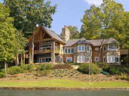 $1 million reduction! Stunning Lake Burton retreat perfect for intimate weekends or for entertaining all of your friends. Set on 2.25 acres w/over 300 ft of waterfront. Extraordinary finishes throughout, 5 fireplaces,3 car garage,2 stall boathouse,detached workshop,outdoor chef's kitchen w/firepit.