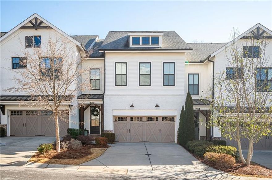 Welcome to 204 Phillips Lane, a stunning home in the desirable Chelsea Walk community of Alpharetta. Enjoy an unbeatable location with direct access to the Alpharetta Loop, connecting you to Downtown Alpharetta and Avalon for premier dining, shopping, and entertainment.  This townhome features an open floor plan with 10-foot ceilings, a spacious kitchen island, a gas-burning stove, and ample storage. Enjoy two outdoor spaces overlooking the Alpharetta Loop, plus an unfinished basement with endless potential. Upstairs, the primary suite boasts a large walk-in closet, double vanities, and a luxurious soaking tub, combining comfort and opportunity in a prime location!