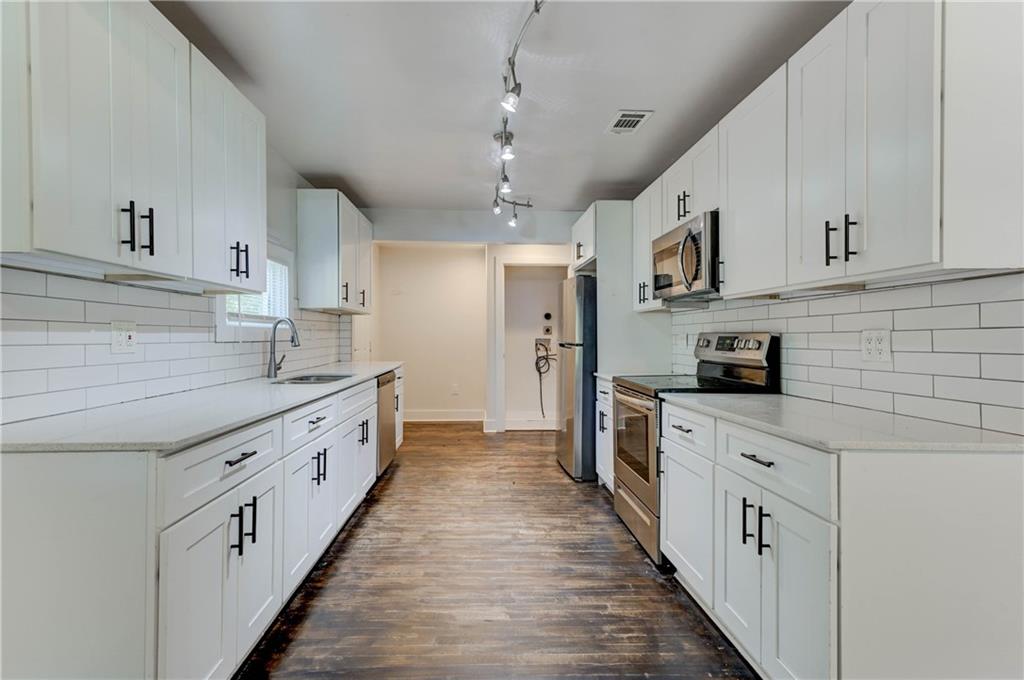 Turnkey Duplex Opportunity in HOT Atlanta Neighborhood !
Welcome to 1914 North Ave NW—a fully renovated gem offering two units in one of Atlanta’s most rapidly growing neighborhoods. Perfect for investors or savvy buyers looking to house hack, this property features a spacious 3 bed / 2 bath main level and a separate 1 bed / 1 bath basement unit, each with private entrances and updated interiors.
Live in one unit and rent out the other to offset your mortgage—or rent both for a strong cash-flowing investment. Upstairs Unit (3/2): Estimated $2,100/mo. Downstairs Unit (1/1): Estimated $1,500/mo.
This is a turnkey rental opportunity with everything done for you. Whether you’re a first-time investor or expanding your portfolio, this property is positioned for success in a market where values and rents continue to rise. Great income potential. Prime location close to the Beltline, West Midtown, and major development projects. Vacant and ready for immediate occupancy or tenants.
Don’t miss this chance to own in one of Atlanta’s hottest neighborhoods. Schedule your showing today and start building wealth through real estate.