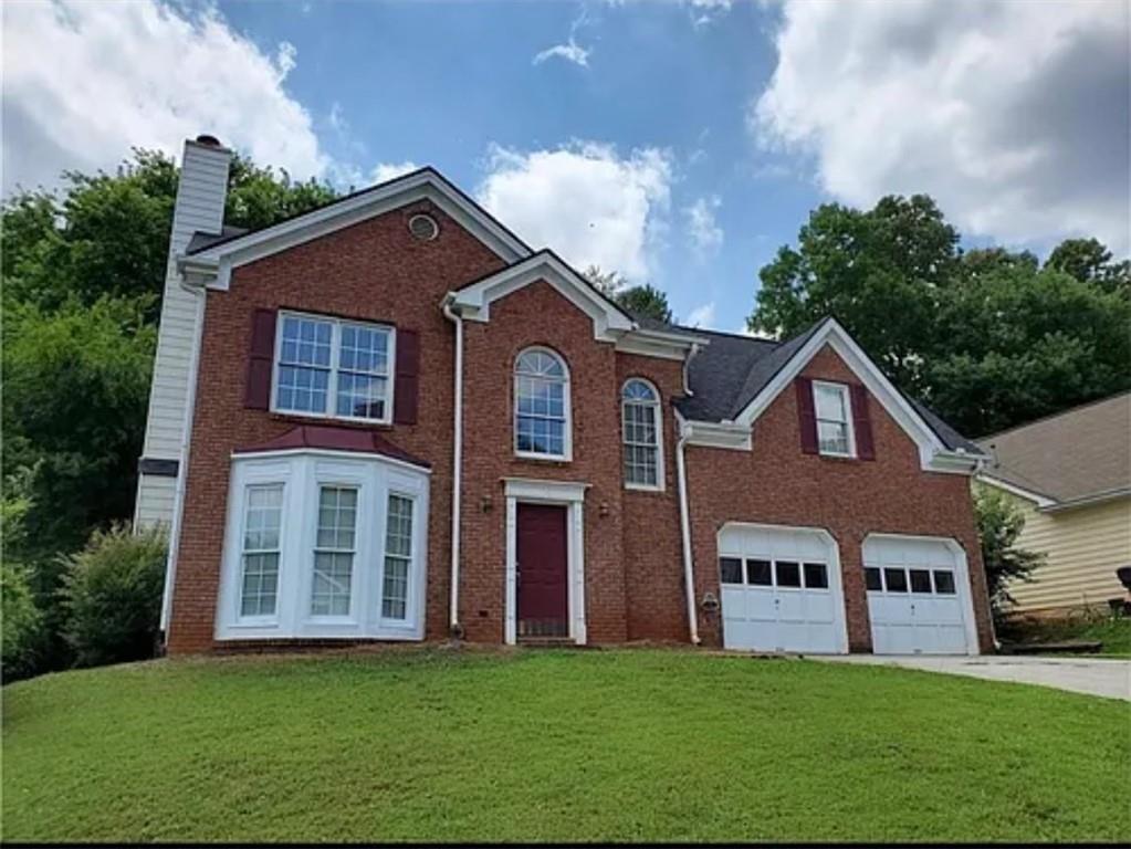 Wonderful 4-Bedroom Home in Lawrenceville. Step into this beautiful home through a two-story foyer that sets the tone for the spacious layout. The main level features new luxury vinyl plank flooring throughout, with the exception of the formal dining room, which is finished with ceramic tile and offers convenient access to the kitchen. The large family room includes a cozy fireplace, while the kitchen is equipped with stainless steel appliances, a prep island, and a charming bay window for an eat-in breakfast nook. Upstairs, the large primary suite includes a tray ceiling, double vanities, and a generous walk-in closet. Three additional spacious bedrooms, one with its own walk-in closet, provides plenty of room for family or guests. A full hall bath and a spacious laundry room, conveniently located on the upper level. Additional features include a two-car garage and an unbeatable location close to shopping, dining, and entertainment.