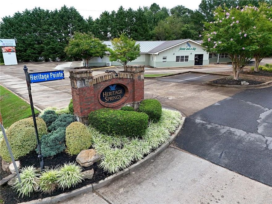 Prime commercial opportunity on highly traveled Highway 92 in the heart of Woodstock’s major growth corridor. This ±6,161 SF freestanding retail/office/flex building sits on approximately ±1 acre and delivers exceptional frontage with roughly 414 feet of visibility to more than 37,000 vehicles per day. Zoned NEC, the property accommodates an expansive range of commercial uses—including medical, wellness, professional office, retail, studio, specialty service, and showroom—making it an ideal choice for both owner-users and investors seeking long-term versatility.

The single-story masonry structure is well-maintained and features a durable metal roof, attractive monument signage, and ±57 striped surface parking spaces. The interior layout includes multiple private offices, open collaborative areas, treatment or conference rooms, two large flexible spaces, and a welcoming reception/check-in zone suitable for customer-facing operations. The building can easily be reconfigured for multi-tenant occupancy, allowing for additional income streams or a hybrid owner-user/investment approach.

Strategically positioned just minutes from Downtown Woodstock, Highway 92 retail nodes, and the I-575 interchange, this location benefits from strong surrounding demographics, high consumer spending, and steady commercial demand. Major national retailers—including Starbucks, IHOP, Ameris Bank, Chick-fil-A, Chicken Salad Chick, Dollar Tree, Publix, and multiple medical/wellness users—anchor the corridor and continue to draw traffic and stability to the submarket.

With its high visibility, flexible zoning, ample parking, and proximity to entrenched retail and residential growth, this property offers exceptional potential for medical practices, wellness centers, professional service firms, retail operators, and investors looking to establish a presence in one of Metro Atlanta’s most desirable and fastest-growing suburban markets.