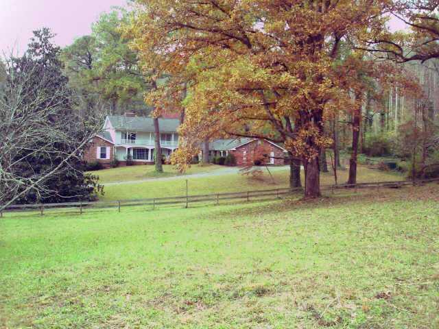 MAGNIFICENT PROPERTY OUTSIDE CITY LIMITS ON NORTHSIDE DRIVE. SOME DEVELOPMENT POTENTIAL. GREAT ESTATE PROPERTY.