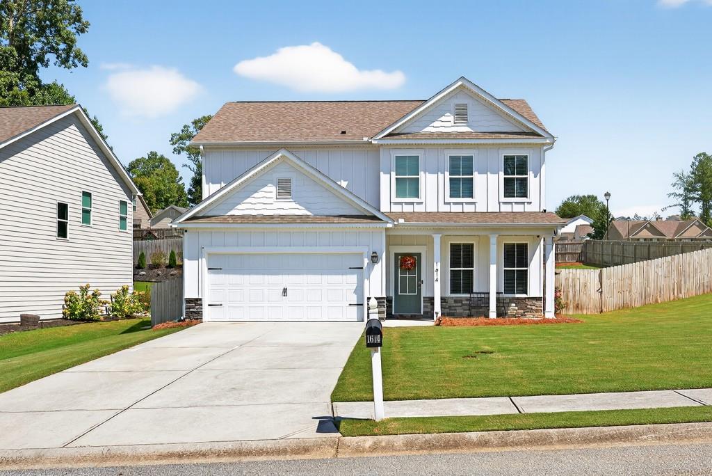 This stunning 4-bedroom, 2-bathroom home offers the perfect blend of comfort, style, and modern living. Freshly painted and move-in ready, it sits on a large corner lot that is beautifully landscaped and fully fenced for privacy. Step inside to an inviting open-concept floor plan featuring a spacious family room, elegant dining area, study, and a gourmet kitchen, with a large island and stainless steel appliances. The private owner's suite showcases a sleek, separate shower and double vanity, creating the perfect retreat. Enjoy outdoor living with a covered front porch and rear patio, ideal for morning coffee or evening gatherings. Additional highlights include a 2-car garage and modern finishes throughout. This home is a rare find and won't last long!