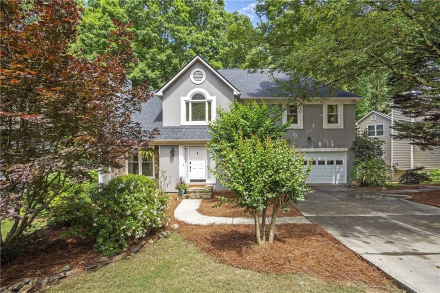 Charming 4-Bedroom Home in the Heart of Mannings Ridge Nestled on a tranquil street in the highly sought-after Mannings Ridge neighborhood, this beautifully renovated 4-bedroom, 3.5-bathroom home offers a perfect blend of modern living and suburban serenity. Just minutes from downtown Alpharetta, residents enjoy the best of both worlds-peaceful surroundings with easy access to vibrant city amenities  The main level boasts a light-filled living area that seamlessly flows into a gourmet kitchen, ideal for both everyday living and entertaining guest. The expansive basement includes a cozy TV room, an additional bedroom and full bath, a laundry area, and a kitchenette-perfect for guests, in-laws, or a private retreat. Enjoy the tranquility of a private backyard from one of two newly replaced decks, offering ample space for relaxation and outdoor gatherings. Recent upgrades include, NEW ROOF, a new water heater and AC unit installed in 2017, ensuring comfort and efficiency. This picturesque subdivision features tree-lined streets and a strong sense of community. Residents have access to amenities such as a clubhouse, swimming pool, and playground. Just a short jaunt or drive away, downtown Alpharetta offers a variety of dining, shopping, and entertainment options. The home is served by excellent schools within the Fulton County School District, including Manning Oaks Elementary, Hopewell Middle, and Alpharetta High School. Don't miss this opportunity to see!
