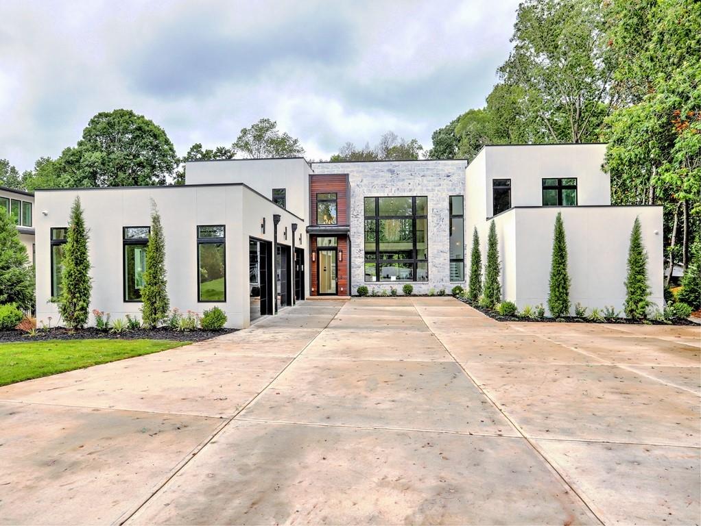 Extraordinary fully integrated modern smart home with exquisite design and every convenience you can imagine built by Bella Fine Homes. Entertainers dream home with resort style outdoor living. No detail overlooked. High end finishes and top quality energy efficient maintenance free building materials. Gated entry. Miele appliance package with built-in espresso machine and 4 ovens, incl steam oven. Lifetime warranty Pella windows. Spray foam insulation. Central Vac throughout. Custom closets with locking jewelry doors/drawers. His + Hers toilets and bidet. Heated floors. Floating vanities. Security cameras. In-ceiling audio/speakers. Lighting control. Wired for Automated shades. In-wall iPad controls. Color changing LED accent lighting. Linear fireplaces. 16ft folding doors open to patio/pool. Outdoor lanai with flushed patio heate, linear fire table, and outdoor kitchen. Walk out main level salt water pool. 12 person hot tub. Outdoor pool bath. Astroturf backyard. Backyard fire pit. 3-car garage with electric car charging port. Generator. Finished Basement with Media Room and Wet Bar. Completion date May 2021.