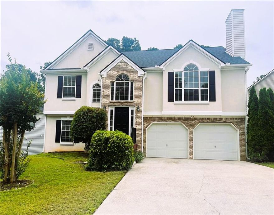 Welcome to this beautifully maintained, multi-split level home, located in a prime Marietta location! This spacious 4-bedroom, 3-bathroom home offers a fantastic blend of comfort, style, and convenience.
Freshly painted and meticulously cared for, this home features a modern, open-concept living space, with vaulted ceilings and stunning hardwood floors throughout, creating an inviting and spacious atmosphere. 
The chef’s kitchen is a true standout, featuring stainless steel appliances, ample cabinet space, and granite countertops. The adjoining dining area is perfect for family meals or dinner parties.
The spacious bonus room in lower level offers endless possibilities, whether it’s a home theater, office, playroom, or even an additional bedroom. There’s also a convenient storage/flex room in the garage, with direct access to the large, fenced backyard. Transform this space into your own home gym or workshop!
The backyard is an absolute retreat, offering plenty of space for children to play on the included playset, or for adults to unwind around the cozy firepit, this backyard is sure to impress.
This home also comes with major updates, including a newer roof (replaced in 2022), ensuring peace of mind for years to come.
Conveniently located just minutes from I-75 and I-285, you’ll have quick access to The Battery, Marietta Square, dining, shopping, major hospitals and entertainment. Plus, enjoy the added benefit of grocery shopping right next door to the community!
This home offers the perfect combination of comfort, location, and value. Don’t miss the opportunity to make it yours!