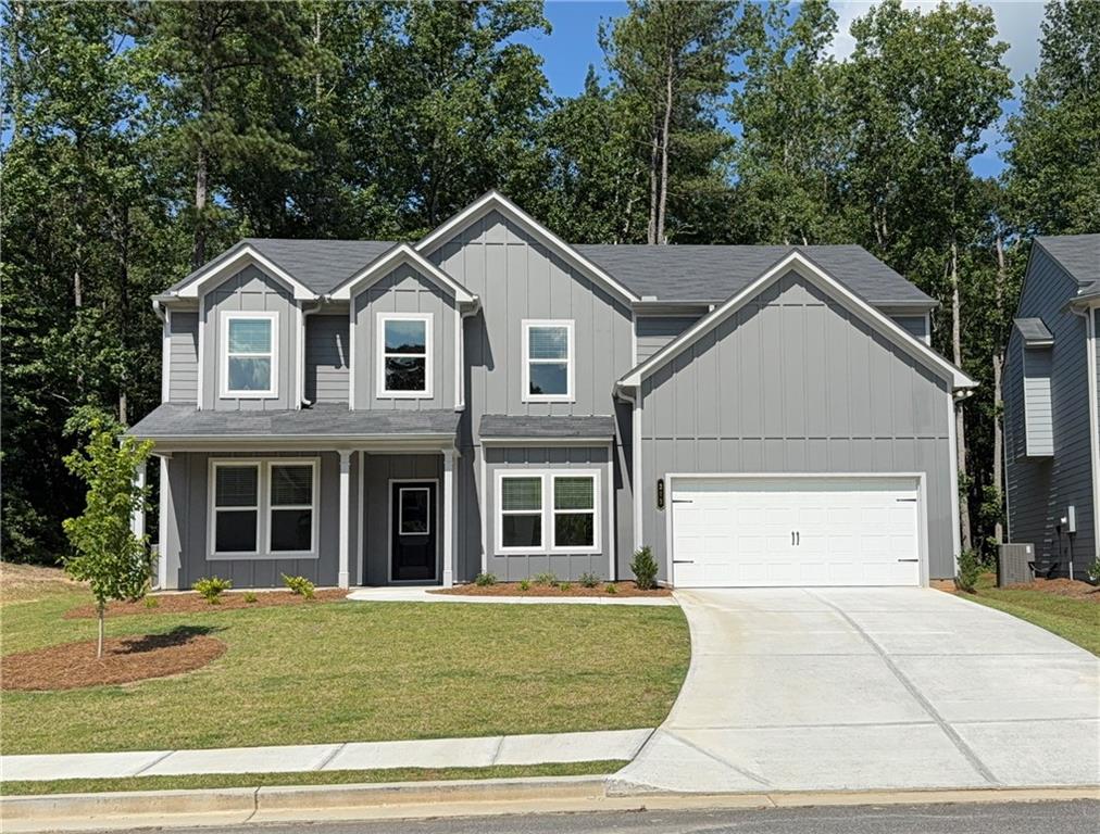 Cartay Plan Lot 10: 5BR/ 3BA Step into easy living with this NEW CONSTRUCTION, MOVE-IN READY home in Braselton, Georgia, tucked away on a quiet lot bordered by green space. The welcoming front porch is perfect for morning coffee, while the wooded backyard offers a private escape. Upon entry, discover a 2-story entryway that opens to a Dining Room on one side and a flexible space—great as an Office or Living Room—on the other. The main floor flows naturally with luxury vinyl plank flooring tying together the Kitchen, Breakfast Area, and Great Room, where a fireplace adds warmth. The Kitchen comes equipped with stainless steel appliances, granite counters, a tile backsplash, a walk-in pantry, and an oversized island for casual meals. A downstairs Bedroom and attached full Bath is convenient for visitors or family staying over. Head upstairs to find a spacious Master Bedroom with a Bath that includes a separate shower and soaking tub, double sinks, a private toilet area, and an expansive walk-in closet. Additional rooms upstairs include three other Bedrooms, a shared full Bath, Media Room and convenient Laundry Room. This home is part of Fox Creek, a quiet community in Jackson County, surrounded by trees and a stocked lake. It’s just 1.5 miles from I-85 (take Exit 126 or 129), and under 2 miles from the small-town charm of Braselton and Hoschton, with their shops, eateries, and community events at the Town Green. Chateau Elan is a mile away for a quick getaway, Northeast Georgia Hospital is 2 miles for reassurance, and Lake Lanier isn’t far for a day on the water. The area offers affordable living, solid schools—like the new Heroes Elementary and Legacy Knoll Middle—and a welcoming feel that’s attracting folks from all over. Fox Creek future amenities will add a clubhouse, pool, playground to the already in place fishing dock and walking trails. This is one of the final homes in this phase—ready now. Call to see it today!