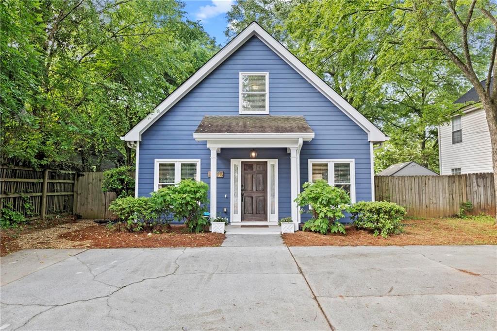 Welcome to this beautifully updated bungalow that perfectly blends classic charm with modern comfort—ideally located in the heart of Kirkwood. Newer than many of the homes in Kirkwood, this thoughtfully designed home offers generous living spaces and room for future growth.
Step inside to a fireside living room filled with natural light, flowing seamlessly into the open-concept dining room and a well-appointed galley kitchen. With two spacious bedrooms and a full bathroom on each level, this home provides comfort and functionality for any lifestyle. The upstairs primary suite is a true retreat, boasting a fully renovated bathroom and rare his-and-hers walk-in closets—an exceptional find in Kirkwood.
Additional features include a versatile loft space on the second level and a convenient mudroom with laundry on the main floor. Storage is abundant throughout the home.
Outdoors, enjoy a private, fenced backyard that has been professionally landscaped and features a brand-new patio—perfect for entertaining or relaxing evenings at home.
Recent upgrades include: Newer windows, Fresh interior and exterior paint, Newly added backyard patio, New gutters, Refinished hardwood floors & New carpet
Located just minutes from all that Kirkwood has to offer, including Pullman Yards, MARTA, Lake Claire, parks, and dining—this meticulously maintained home is a rare opportunity. Don't miss your chance to make it yours!