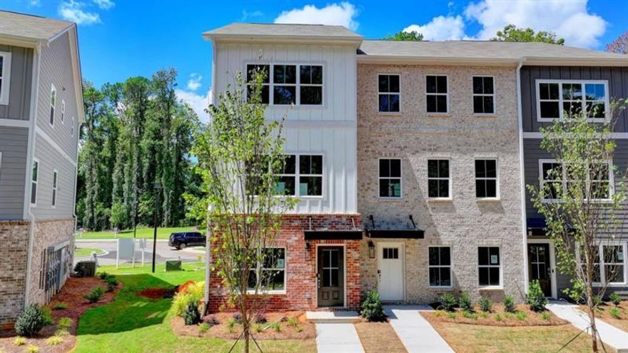 The Dogwood plan built by Create Homes. Quick Move-In! Elevate your lifestyle in this beautiful residence that blends modern design with everyday practicality. Step into the terrace level, a versatile space that can serve as a personal retreat, a dedicated workspace, or a cozy guest room, complete with a walk-in closet and full bath. Ascend the elegant stained stairs to find the vibrant kitchen, featuring stainless steel appliances and a spacious island-perfect for culinary adventures and entertaining loved ones. This open-concept area flows seamlessly into the dining and living spaces, ideal for hosting unforgettable gatherings. Your private rear deck extends your living area, offering a peaceful escape with stunning views-perfect for relaxing after a busy day. The third level hosts your luxurious primary suite, complete with a double vanity and spacious walk-in closet, creating a spa-like retreat. A convenient laundry room and a generous third bedroom round out this floor. With energy-efficient features, smart home technology, and quality construction from Create Homes, enjoy a comfortable, connected living experience. Enjoy the convenience of a location close to shopping, dining, Mable House Amphitheater, Silver Comet Trail, Hartsfield-Jackson International Airport, I-285, I-20, I-75 and the East-West Connector. Don't settle for ordinary-make The Dogwood your dream home today! Ask about $$ Closing Cost contribution with binding contract by 06/30/2025 with preferred lender only.